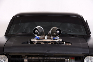Illustration for article titled The Stupidest V8 Turbo Setup Ever.